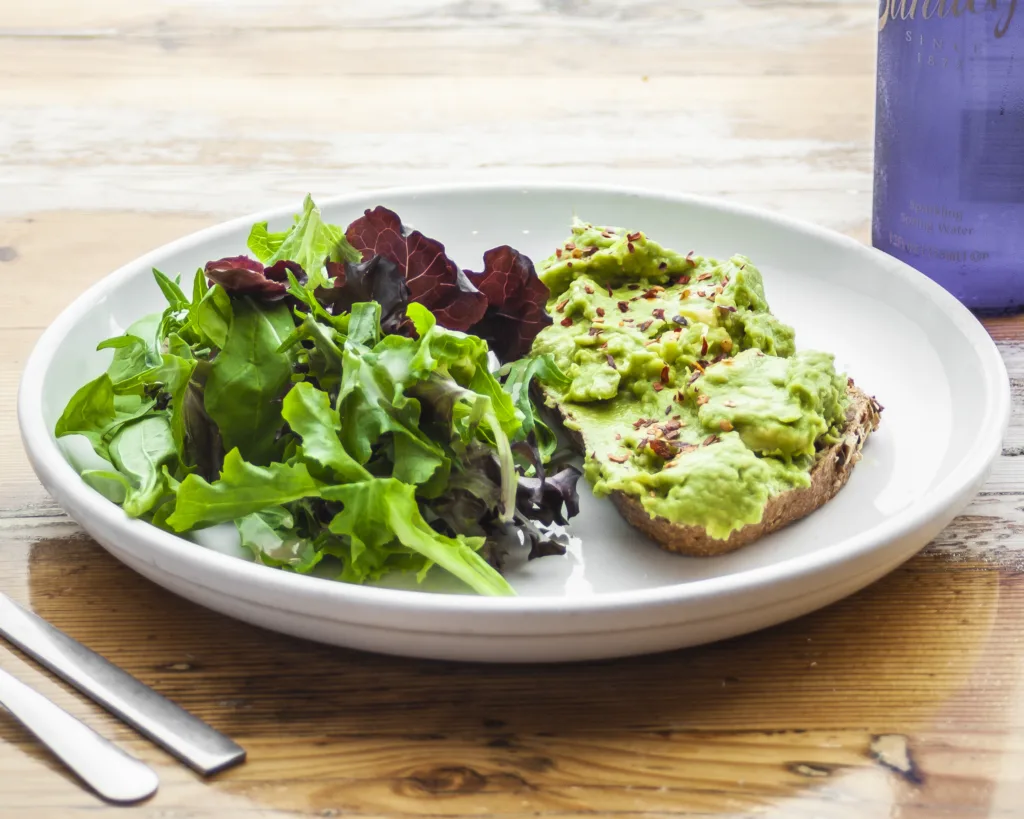 Avocado toast with a side of greens