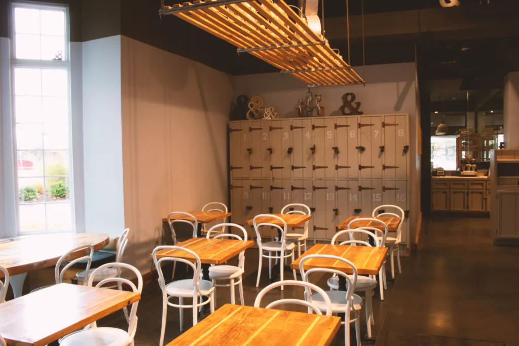 The &grain dining room with wooden tables
